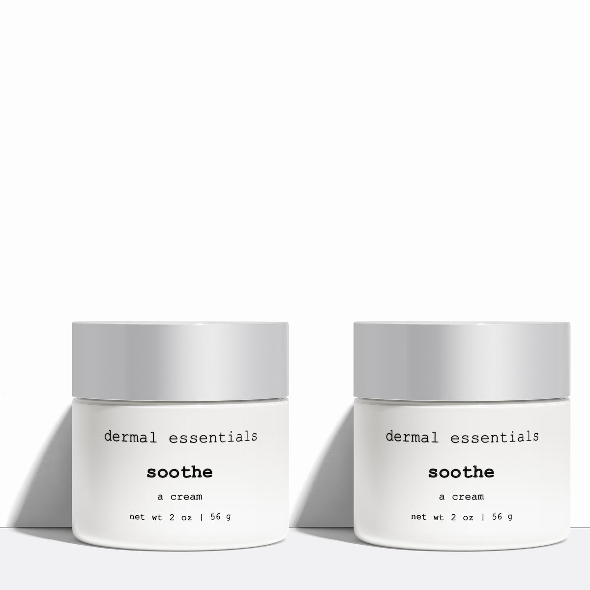 Two White round plastic jars black letters silver twist lid 2 oz. Soothe calming face cream moisturizer Dermal Essentials Medical Grade Skincare