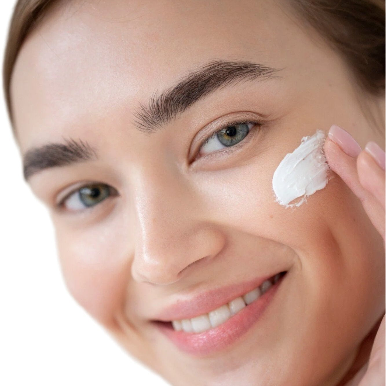 young-white-woman-applying-face-cream