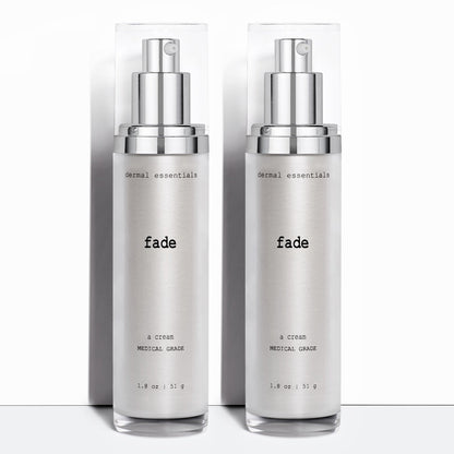 Two Silver cylinder plastic bottles black letters silver plastic pump clear plastic cap 1. 8 oz. Fade lighten hyperpigmentation cream Dermal Essentials Medical Grade 