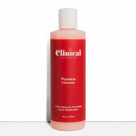 Clear cylinder plastic bottle white cap  red label pink pumice acne cleanser 8 oz. Best pumice acne facial cleanser. Non-drying benzoyl peroxide acne facial cleanser. Dermal Essentials Medical Grade Skincare.