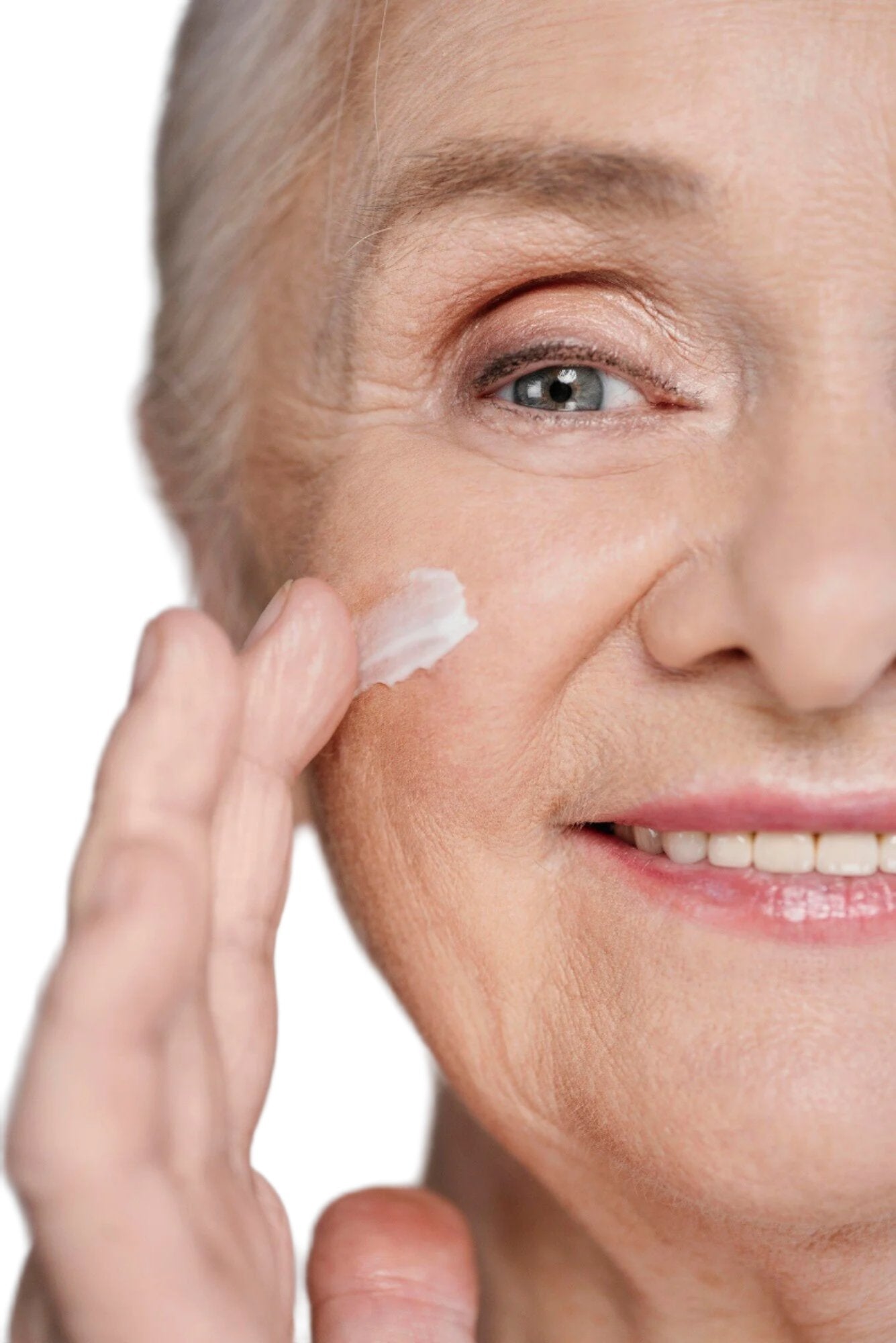 Mature white woman grey hair applying  best anti-aging face mask. Dermal Essentials medical grade skincare.