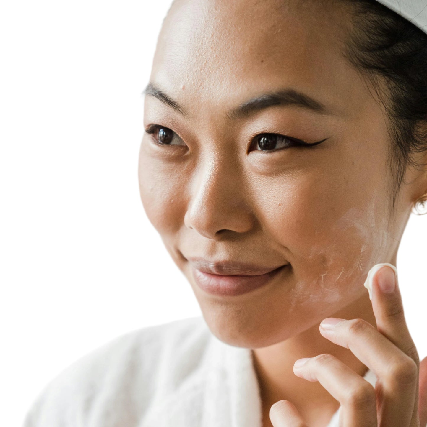 Asian woman face black hair applying oil free moisturizer cream with fingers