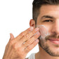 White man brown hair with beard applying best oil free moisturizer to face. Dermal Essentials medical grade skincare.