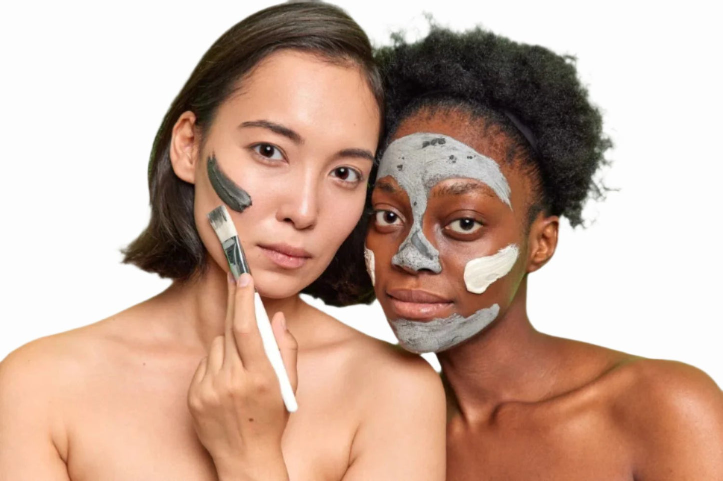 asian woman black woman applying sulphur  acne  facial mask with white brush dermal essentials clinical skincare