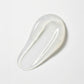 A translucent, teardrop-shaped silicone or rubber pad with a glossy finish, shown on a clean white background.