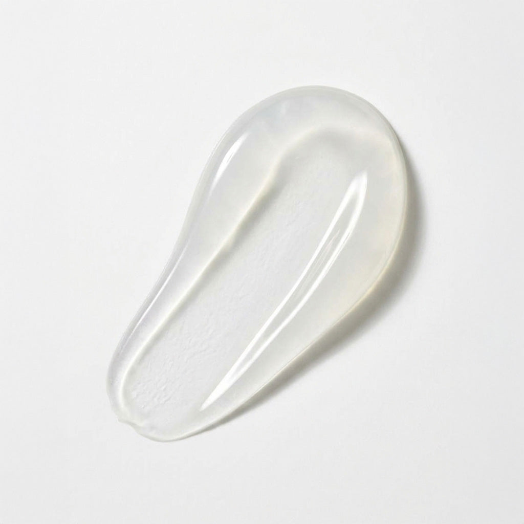 A translucent, teardrop-shaped silicone or rubber pad with a glossy finish, shown on a clean white background.