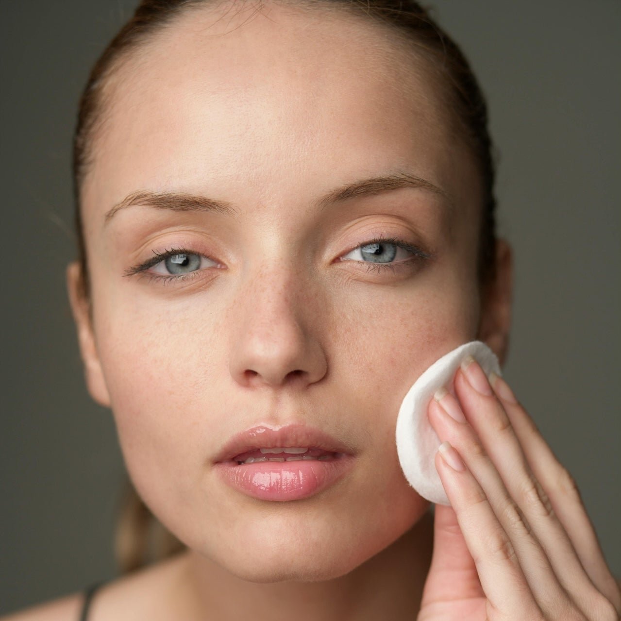 applying facial toner