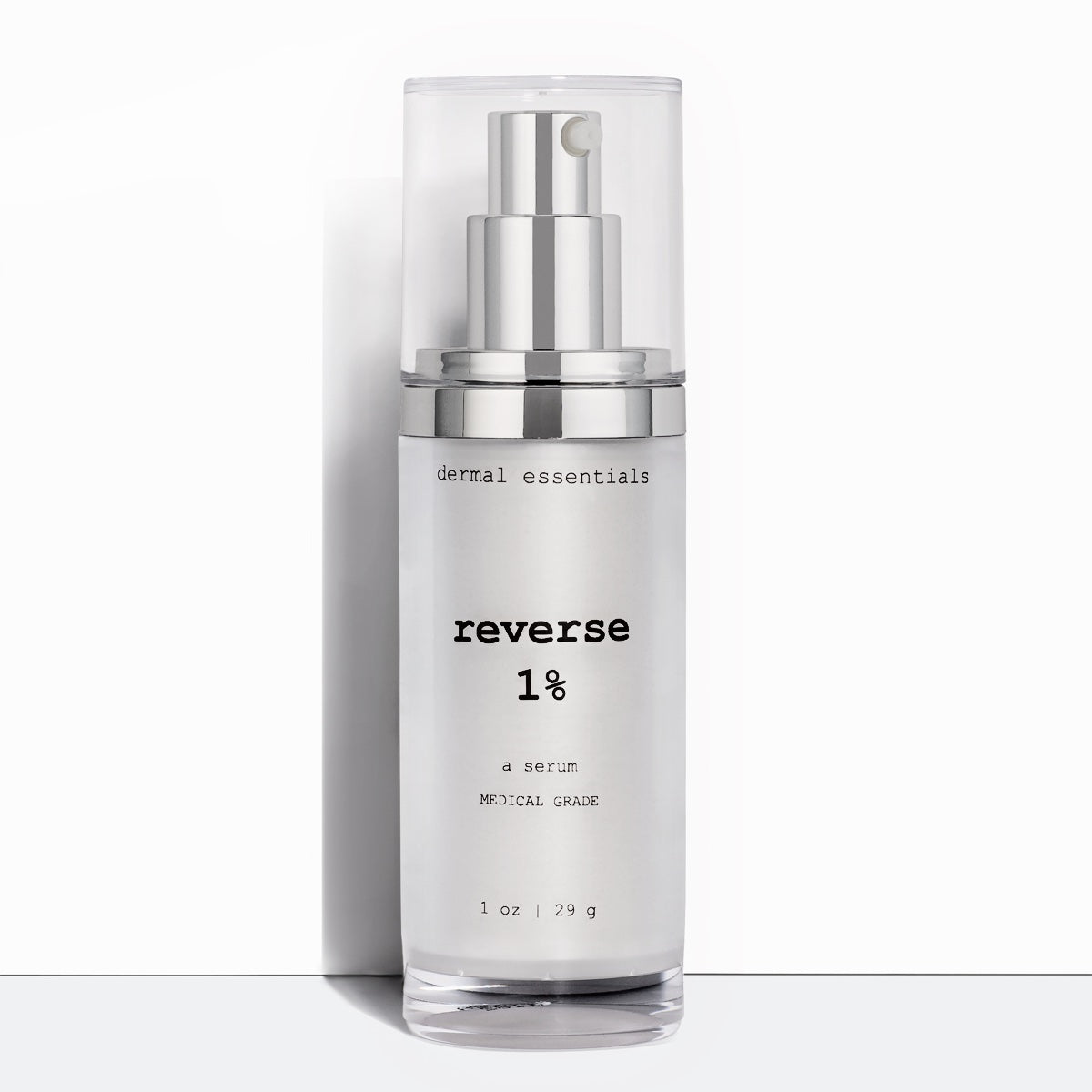 Silver cylinder plastic bottle  black letters silver plastic pump clear plastic cap 1 oz. Best anti-aging 1% retinol and vitamin C face serum. Dermal Essentials Medical Grade Skincare.