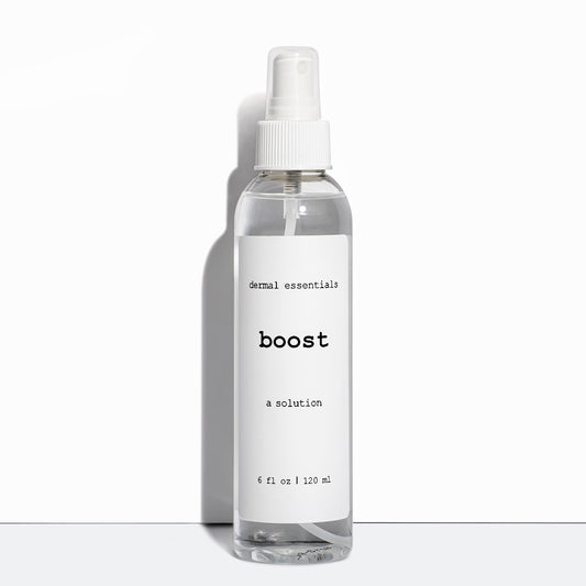 Clear cylinder plastic bottle white label black letters white spray nozzle clear plastic lid 6 fl. oz. Boost calming facial spray Dermal Essentials Medical Grade Skincare  