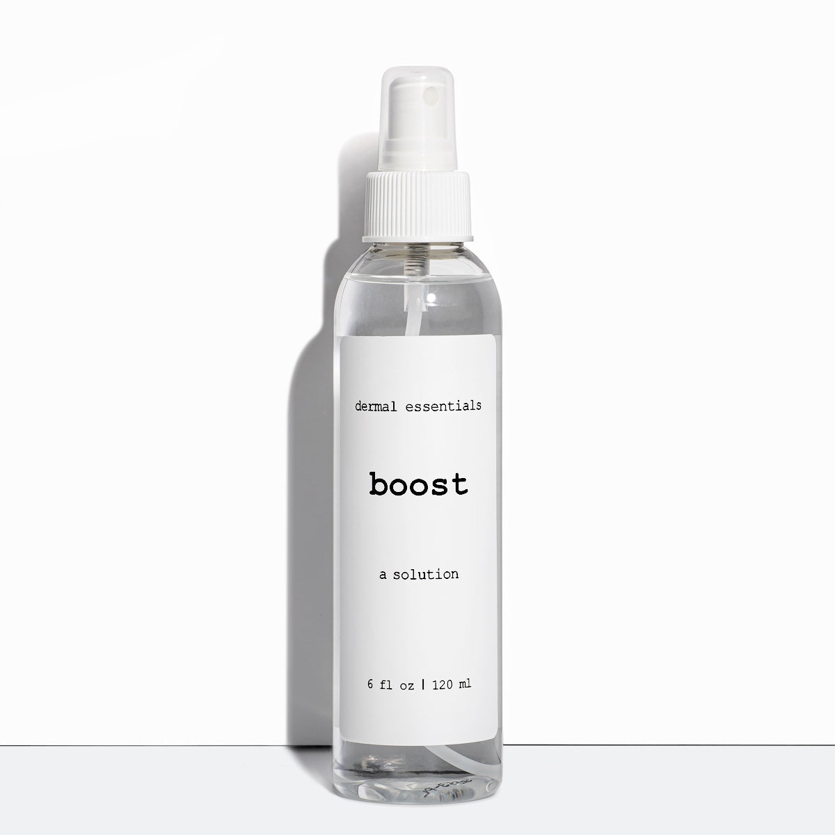 Full size 6 fl.oz. Clear cylinder plastic bottle white label black letters white spray nozzle clear plastic lid. Boost is a calming facial spray Dermal Essentials Medical Grade Skincare  . A mini size is 5 ml of this facial toner skincare product  in a white plastic pump bottle with black letters and clear lid.