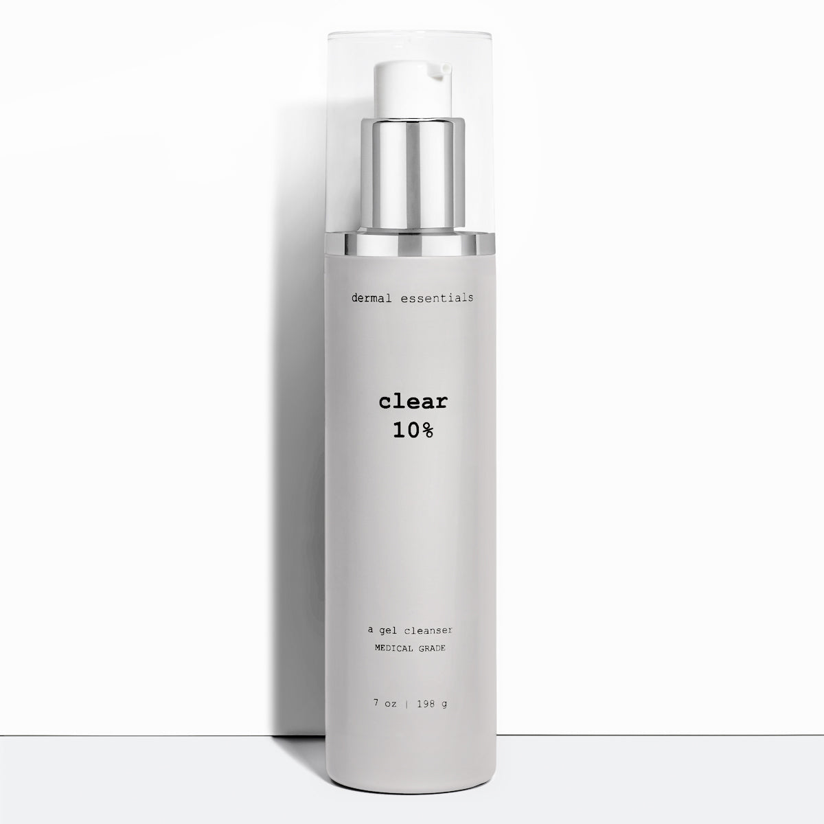 Full size 7 oz. Silver cylinder plastic bottle silver white pump clear plastic lid. Clear is a  benzoyl peroxide acne facial cleanser Dermal Essentials Medical Grade Skincare. A mini size is 5 ml of this facial cleanser skincare product   in a white plastic pump bottle with black letters and clear lid.
