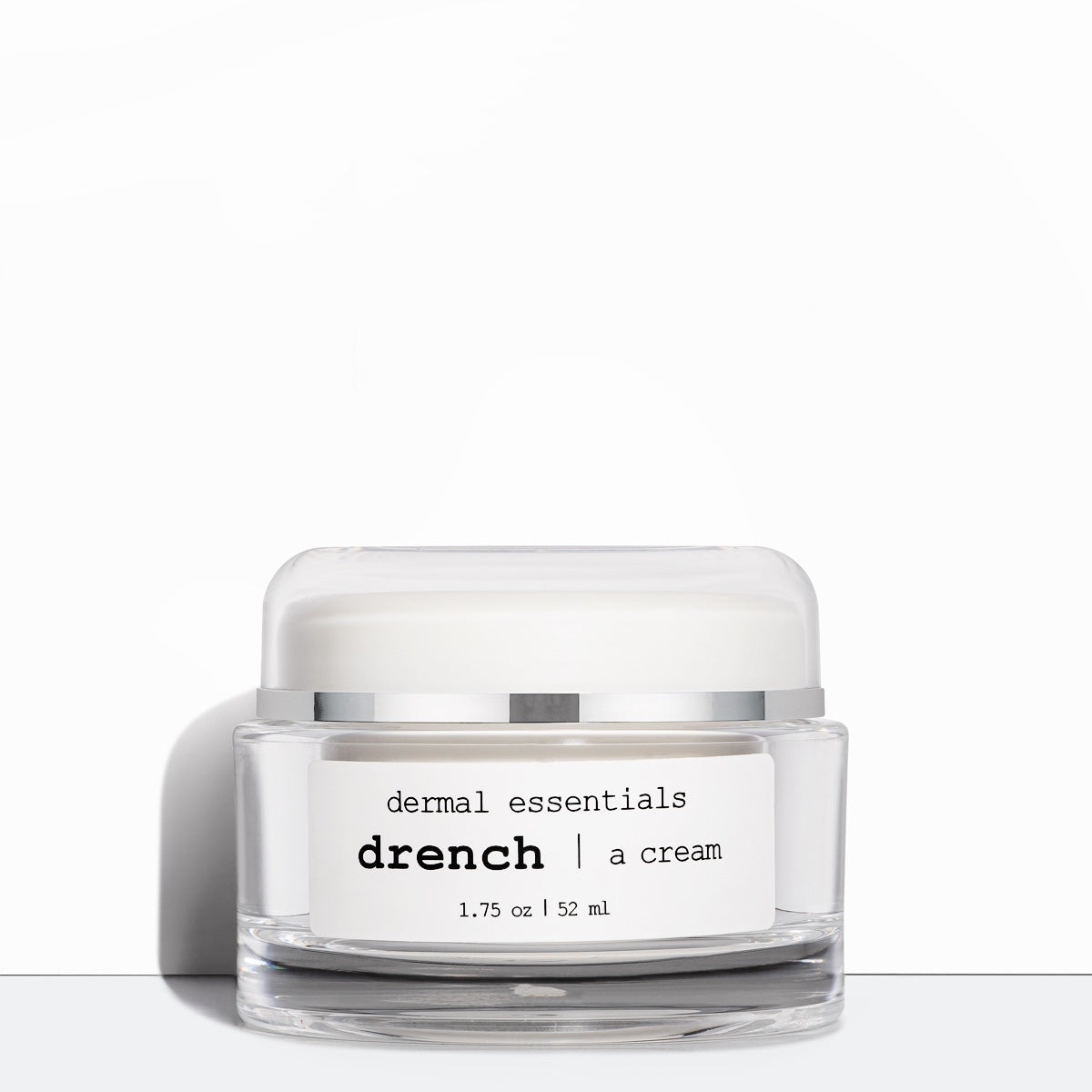 Full size 1.75 oz. Clear round plastic jar white label  black letters round plastic twist lid. Drench is a beauty cream moisturizer ceramides peptides antioxidant Dermal Essentials Medical Grade Skincare. A mini size is 5 ml of this peptide facial cream skincare product  in a round clear plastic jar white label with black letters white screw lid.